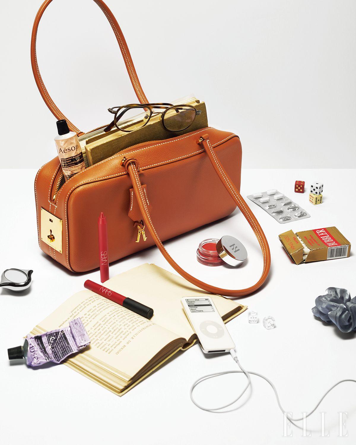 캐멀 브라운 톤의 에버그레인 카프스킨 포브르 익스프레스 백은 가격 미정, Hermès.