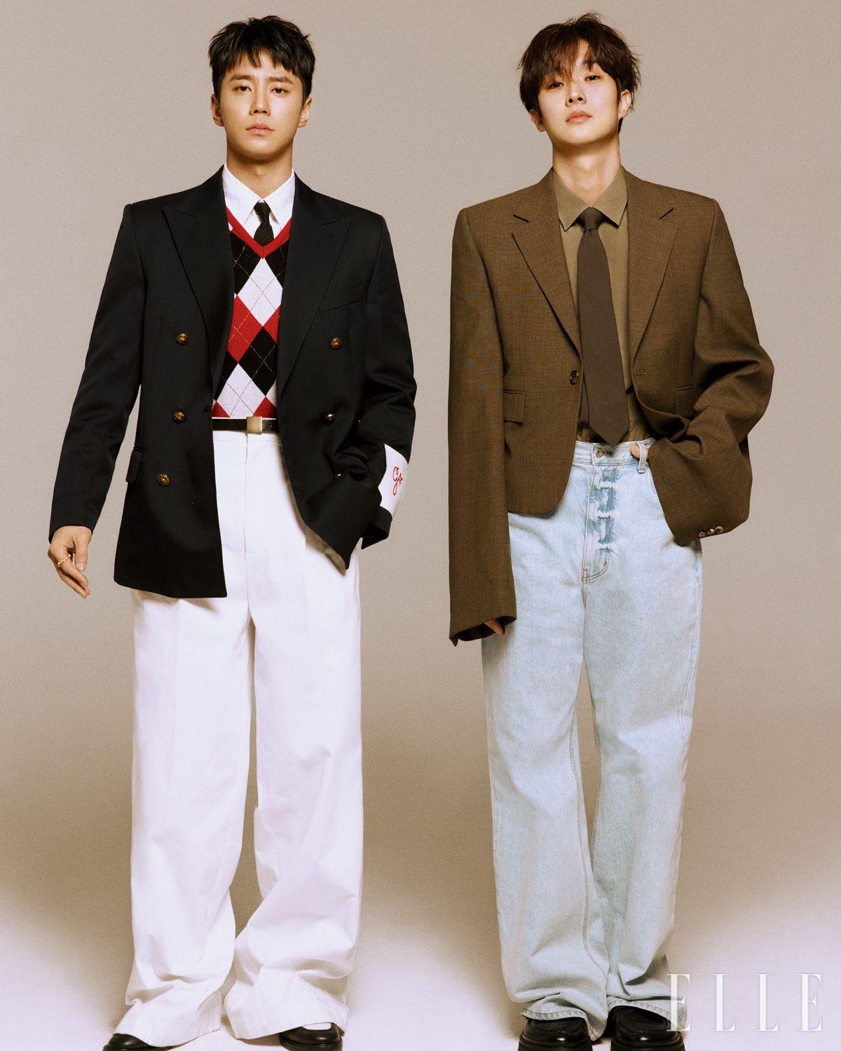 이준영이 입은 네이비 더블 재킷은 Golden Goose. 아가일 패턴의 니트는 Lecyto. 화이트 플리츠 팬츠는 Loewe. 슈즈와 타이, 벨트와 링은 모두 스타일리스트 소장품. 최우식이 입은 재킷과 올리브 컬러 셔츠는 모두 Loewe. 데님 팬츠는 Stu. 블랙 로퍼는 Ami. 올리브 컬러 타이는 스타일리스트 소장품. 
