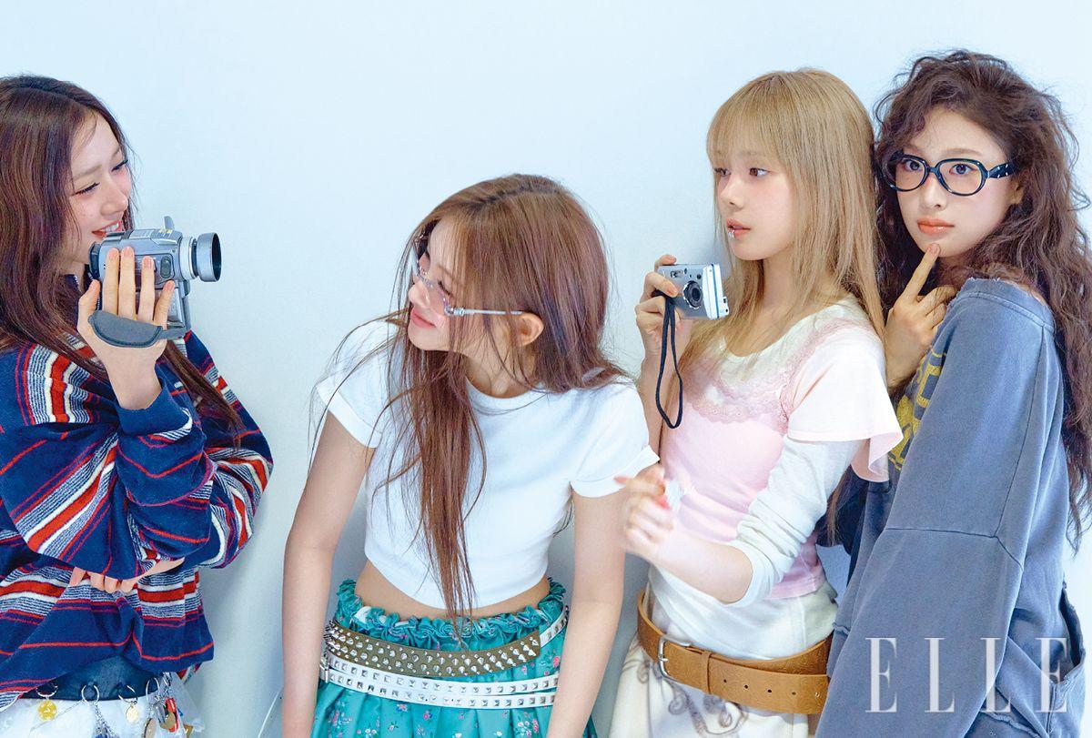 쿠미가 입은 스트라이프 니트는 Miu Miu. 화이트 레이스 스커트는 Yuhan Wang. 이어링은 Yvmin. 이현이 입은 플라워 패턴의 스커트는 Shushu/Tong. 스터드 레더 벨트는 August Barron. 화이트 톱과 아이웨어는 모두 스타일리스트 소장품. 