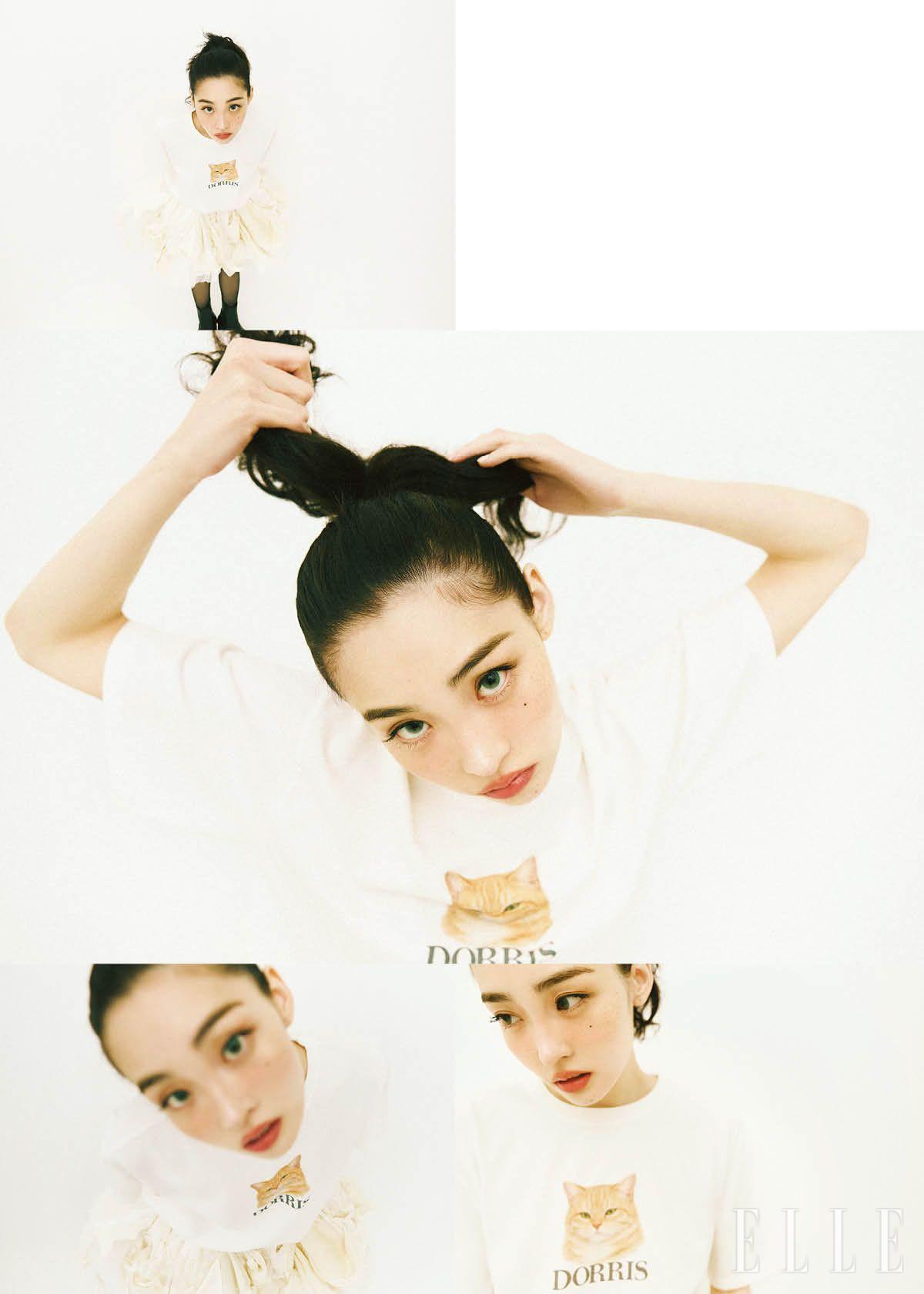 고양이 프린트 티셔츠는 Centaur. 구조적인 튤 미니스커트는 Gyouree Kim. 