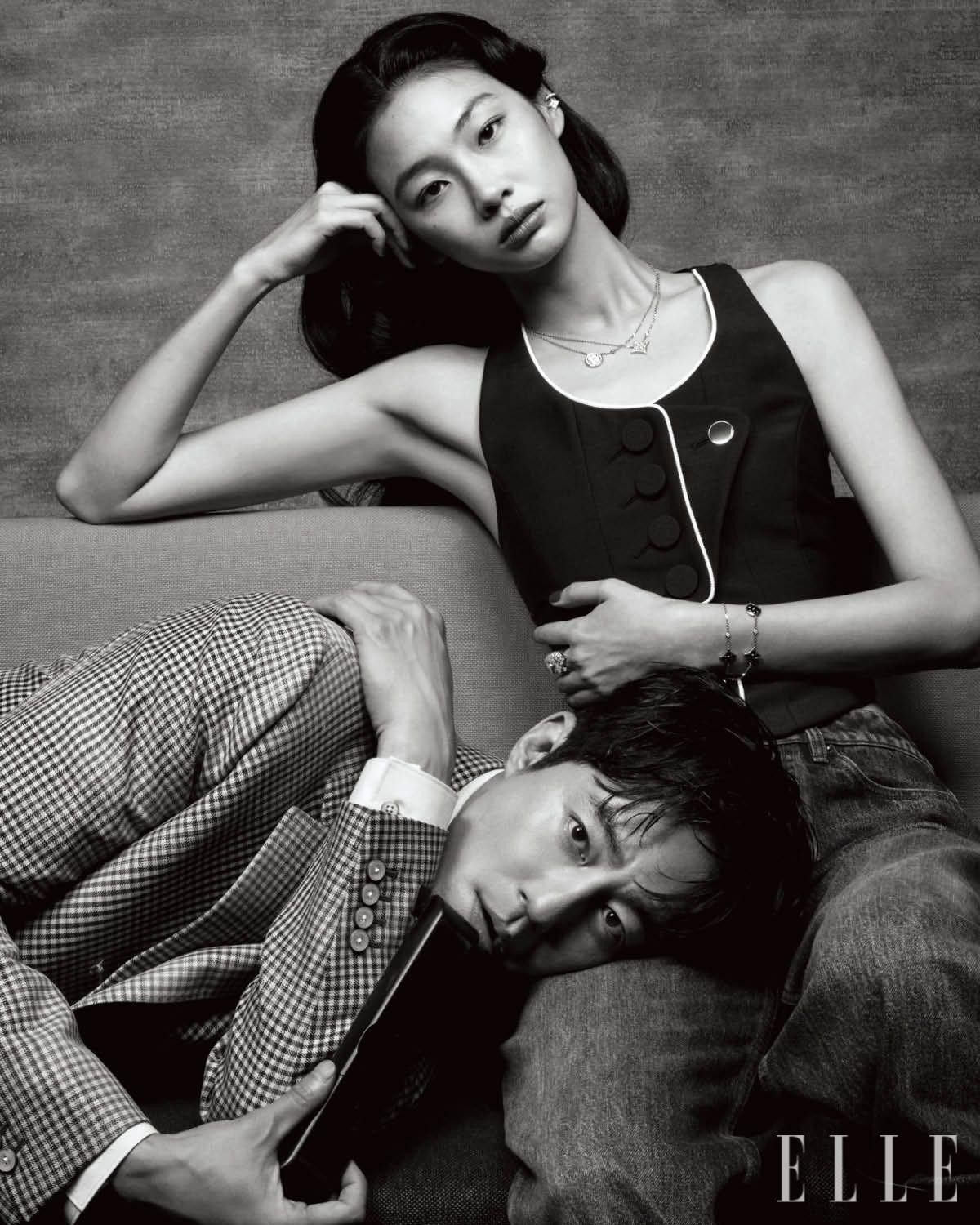 조인성이 입은 재킷과 셔츠는 모두 Louis Vuitton. 정호연이 착용한 다이아몬드를 세팅한 핑크골드의 컬러 블라썸 XS 스타 이어 커프와 선 펜던트 네크리스, 스타 펜던트 네크리스, 중지에 착용한 미니 스타 링과 선 링, 옐로골드 오닉스 세팅의 컬러 블라썸 BB 멀티 모티프 브레이슬릿, BB 스타 브레이슬릿, 핀스트라이프 톱, 스트레이트 컷 데님은 모두 Louis Vuitton.