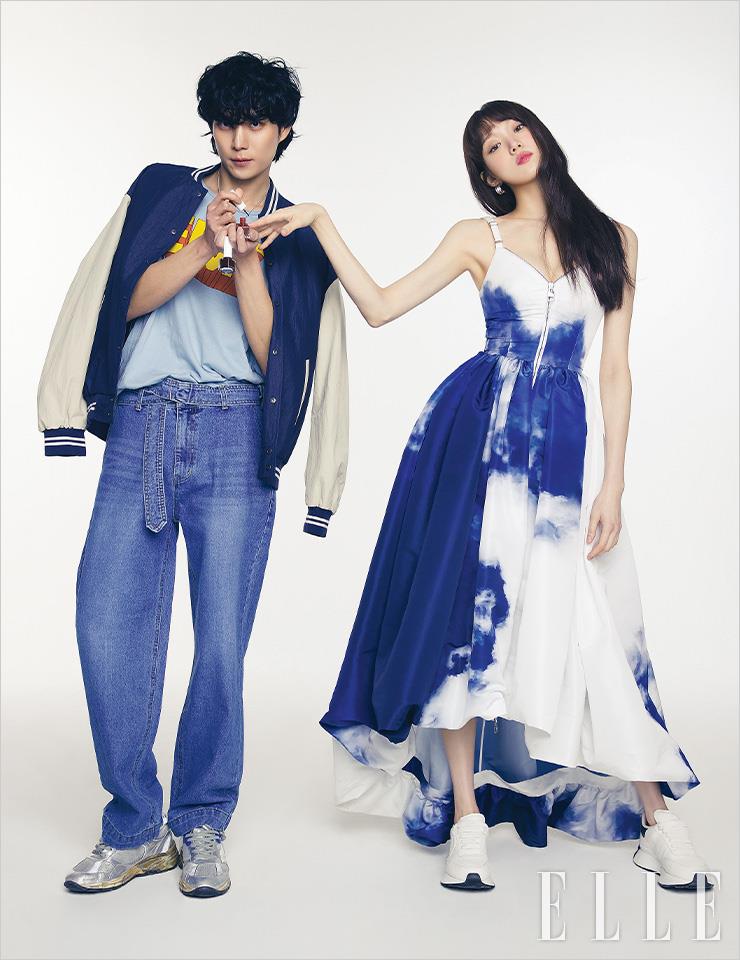김영대가 입은 보머재킷은 Uniis Design. 데님 팬츠는 Beyond Closet. 스니커즈는 Golden Goose. 네크리스는 Quarqor x Amondz. 티셔츠는 스타일리스트 소장품. 이성경이 입은 드레스와 슈즈는 모두 Alexander McQueen.