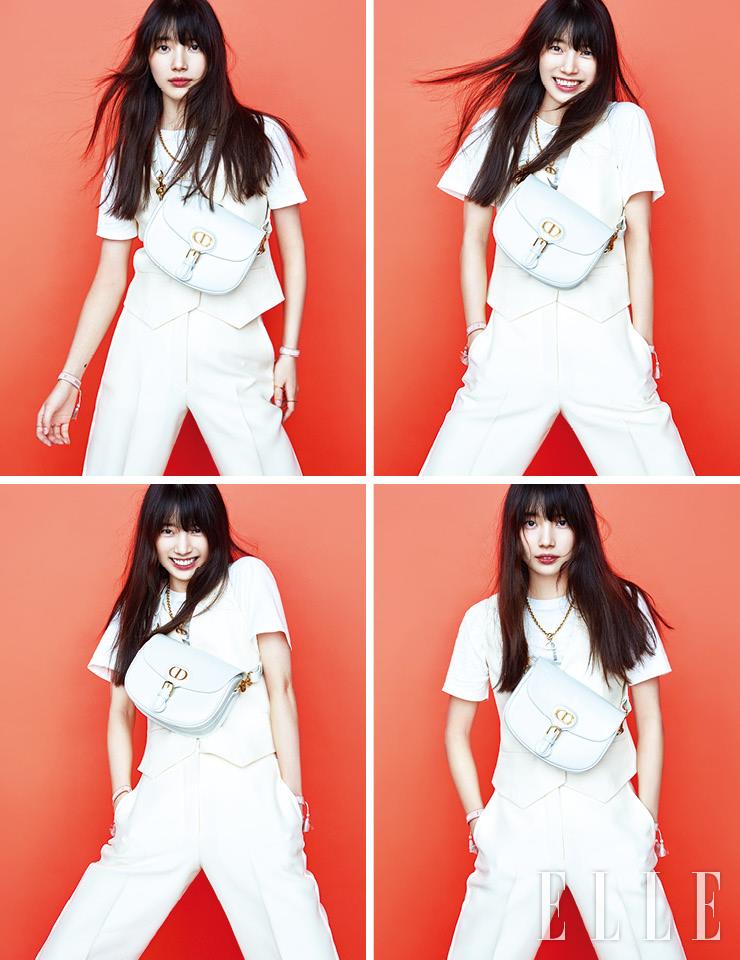 화이트 베스트와 팬츠, 티셔츠, 펜던트 네크리스, 양팔에 착용한 코튼 브레이슬렛, 양손에 착용한 골드 링, 크로스백으로 연출한 디올 바비 백은 모두 Dior.