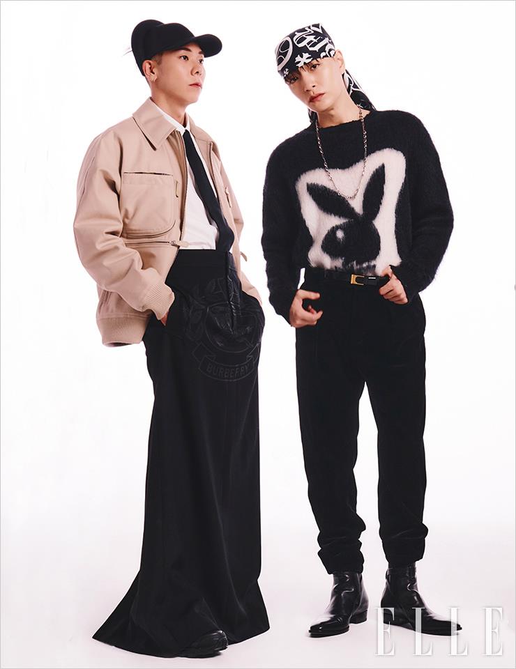 로꼬가 입은 재킷과 스커트, 셔츠와 타이, 착용한 슈즈와 모자는 모두 Burberry. 사이먼 도미닉이 입은 니트 풀오버와 팬츠, 부츠는 모두 Rick Owens. 헤드 스카프는 Chrome Hearts.