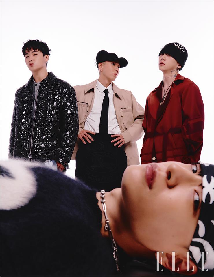쿠기가 입은 재킷과 니트, 재킷과 팬츠는 모두 Dior. 로꼬가 입은 재킷과 스커트, 셔츠와 타이, 모자는 모두 Burberry. 우원재가 입은 롱 재킷과 팬츠는 모두 Jiyongkim. 사이먼 도미닉이 입은 니트 풀오버는 Rick Owens. 헤드 스카프는 Chrome Hearts.