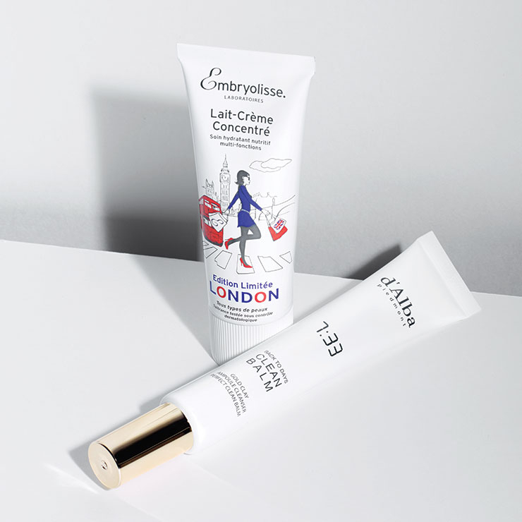 (왼쪽) 화보 촬영 전 메이크업 아티스트들이 모델에게 발라주는 수분크림으로 유명해진 레 크렘 콘센트레. 기존 제품에 사랑스러운 일러스트레이션을 더해 한정판으로 출시했다. 로션과 크림 사이의 부드러운 제형이 윤기 흐르는 피부를 완성해 준다. 레 크렘 콘센트레 런던, 2만3천원, Embryolisse. (오른쪽) 얼굴에 직접 짜서 사용하는 클렌징 밤으로 미세한 골드클레이 입자가 짙은 아이 메이크업과 모공 속 노폐물까지 자극 없이 제거해 준다. 뾰족한 애플리케이터라 양 조절이 쉽고 위생적이다. 백투데이즈 클린 밤, 2만2천원, D’alba. 