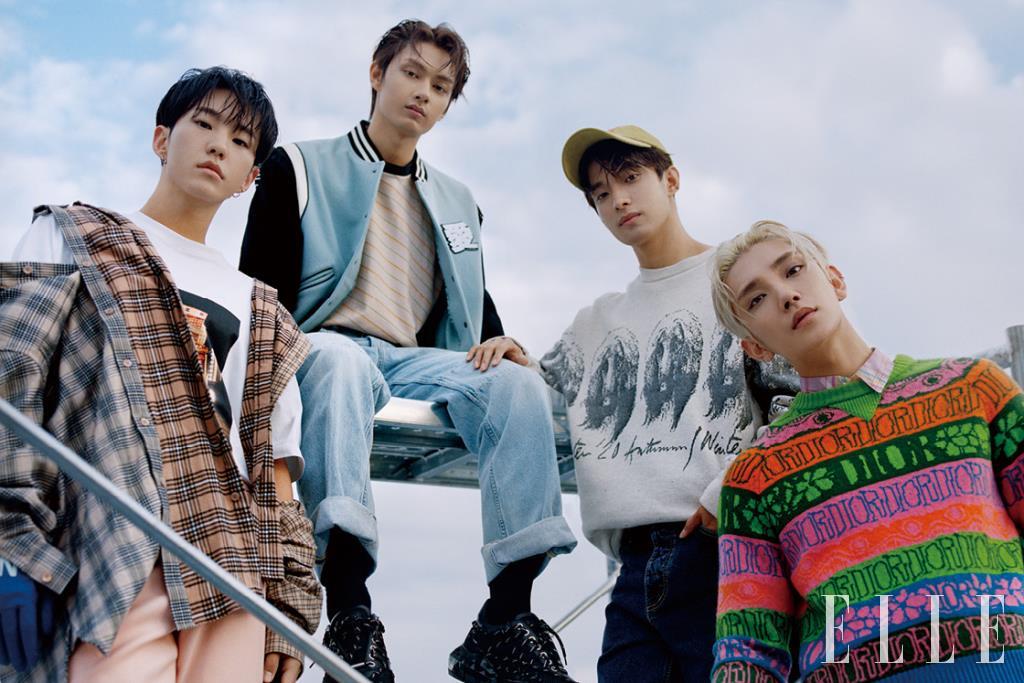 호시가 입은 체크 셔츠와 이너 웨어 톱, 팬츠는 모두 Burberry. 준이 입은 재킷은 Ports V. 티셔츠는 Marni. 데님 팬츠는 스타일리스트 소장품. 스니커즈는 Jimmy Choo. 도겸이 입은 스웨트셔츠는 Paul Smith. 데님 팬츠는 스타일리스트 소장품. 볼캡은 Blur1.0.조슈아가 입은 니트 톱과 이너 웨어 셔츠는 모두 Dior.