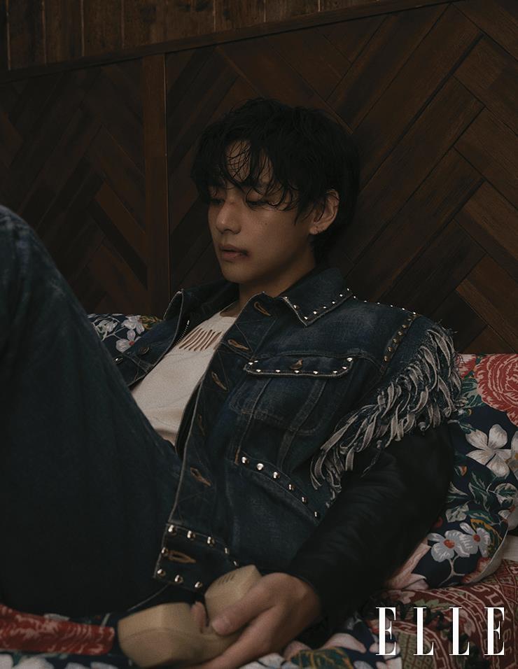 Denim Vest with Studs and Fringes with Black Leather Jacket, White Top, and Denim Pants are all from Celine Homme.