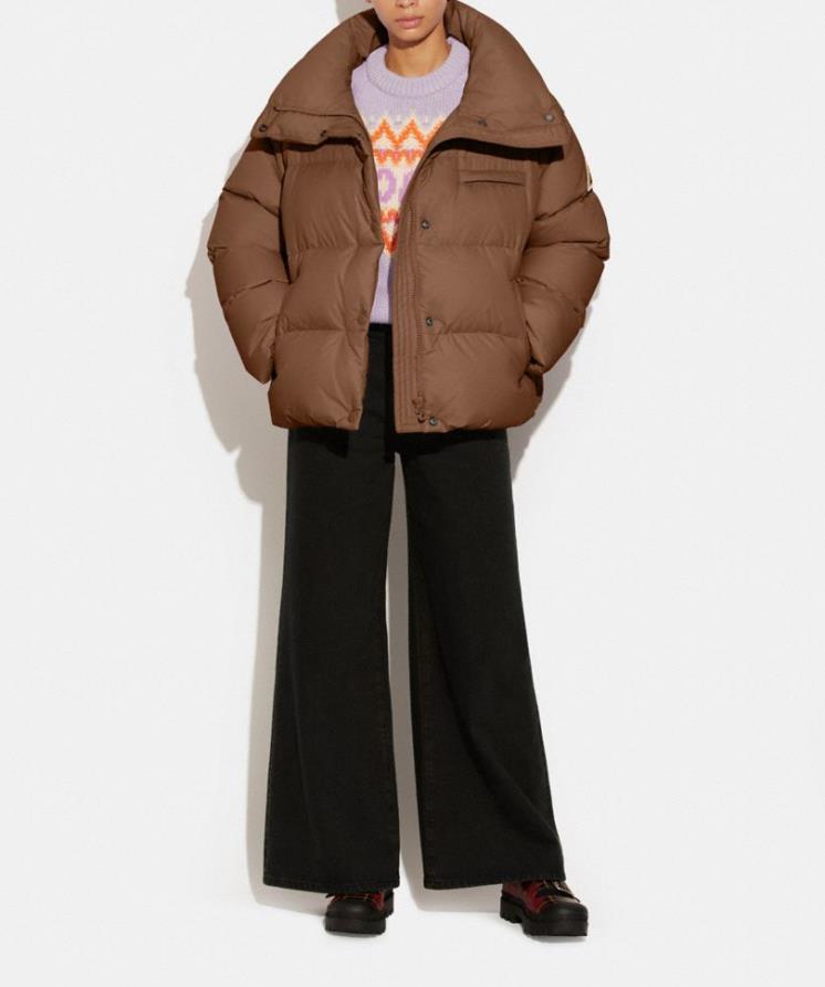 울과 알파카 혼방 라일락 페어 아일 스키 스웨터는 80만 원, COACH.