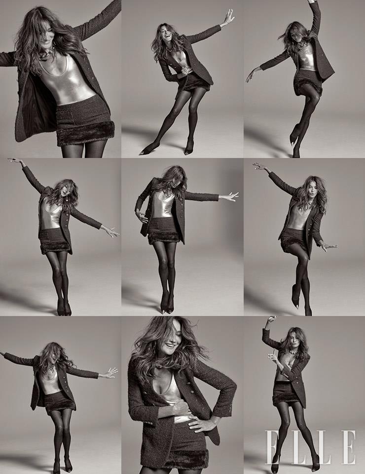 트위드 재킷과 보디수트, 메탈릭 쇼츠, 라인스톤 이어링, 체인 네크리스, 스타킹은 모두 Saint Laurent by Anthony Vaccarello.