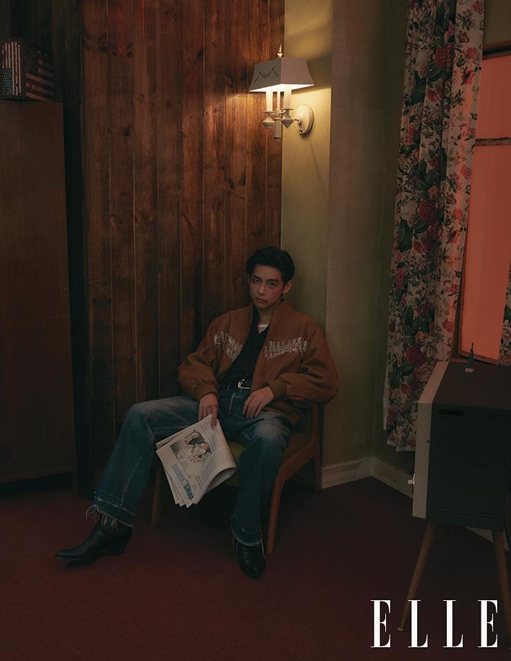 Blouson with Chain Fringes, Black Shirt, White Mesh Top, Wash Denim Pants, Belt, and Ankle Boots are all from Celine Homme.