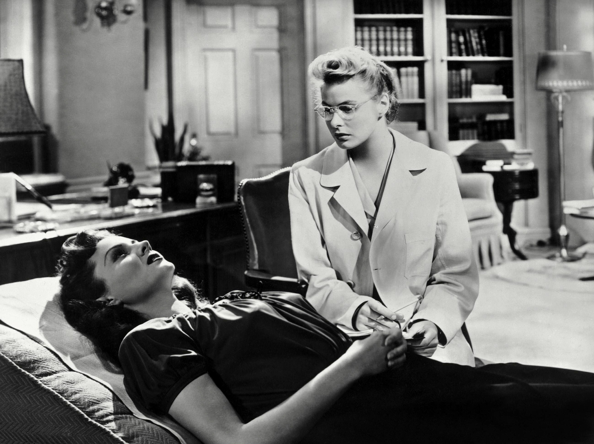 Rhonda Fleming & Ingrid Bergman Characters: Mary Carmichael & Dr. Constance Petersen Film: Spellbound (USA 1945) Director: Alfred Hitchcock 31 October 1945   Date: 31-Oct-1945
